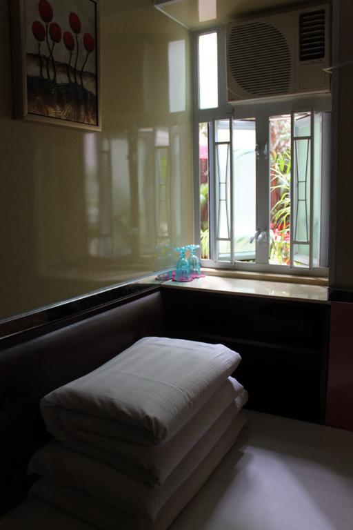 Hoi Shing House Hotell Kowloon  Rum bild