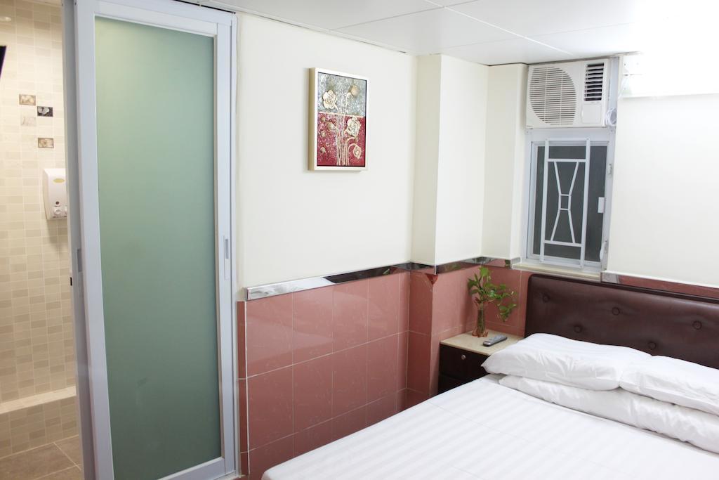Hoi Shing House Hotell Kowloon  Rum bild